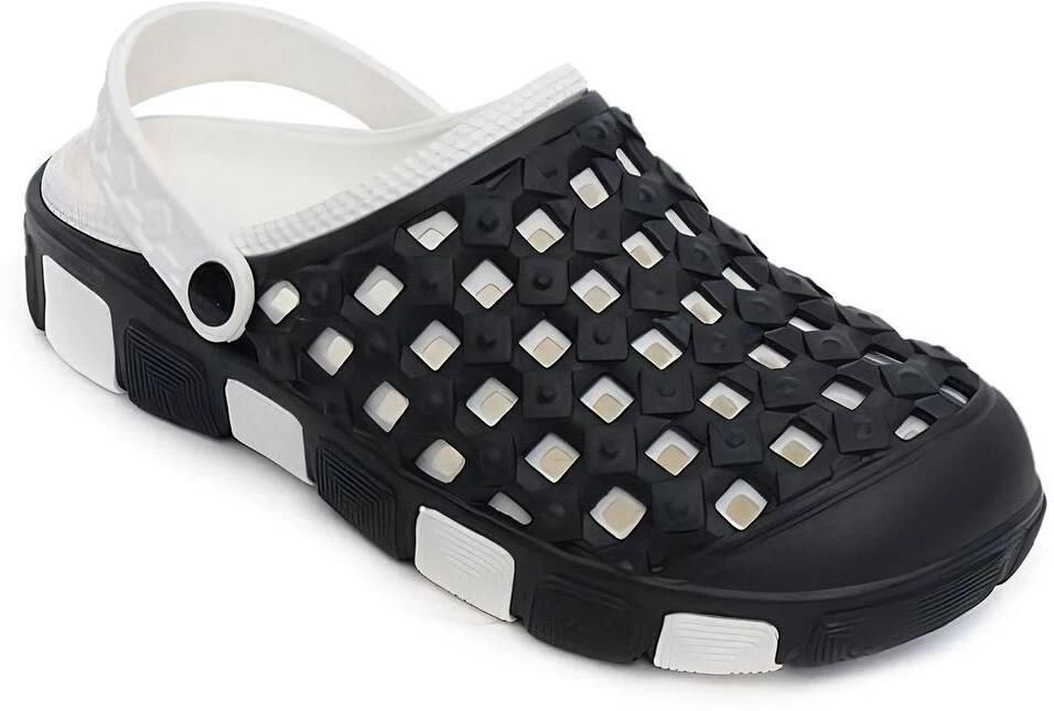 Black and white sandal with woven design on a white background