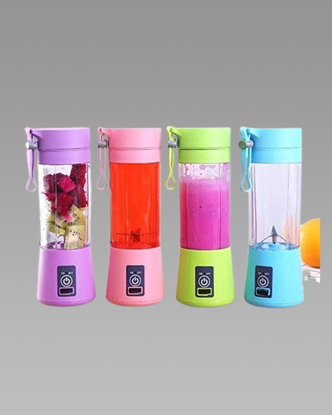 Four colorful portable blenders on a gray background