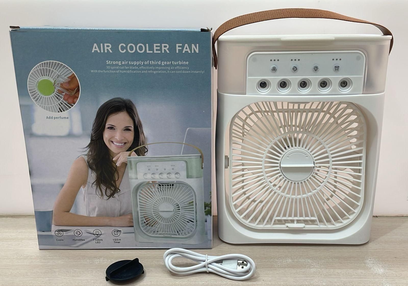 Air cooler fan with packaging on a wooden surface